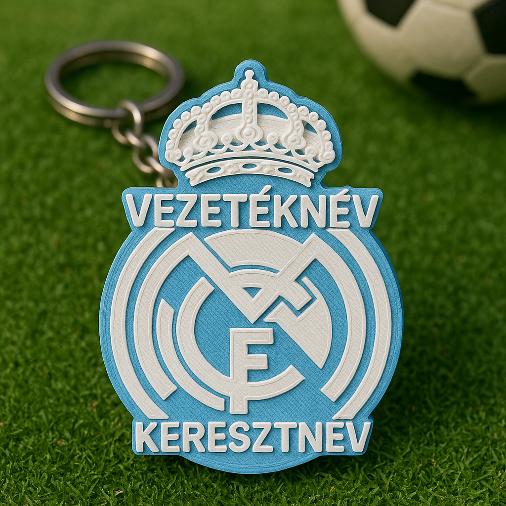 Real Madrid kulcstartó, egyszerű egyszínű sötétben világító fekete felirattal.